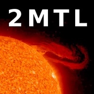 A photo of a solar flare emanating from the sun with the text 2MTL superimposed